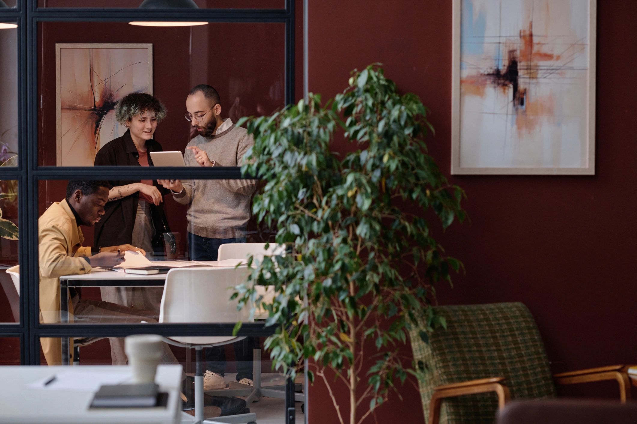Colleagues reviewing a financial plan in an office